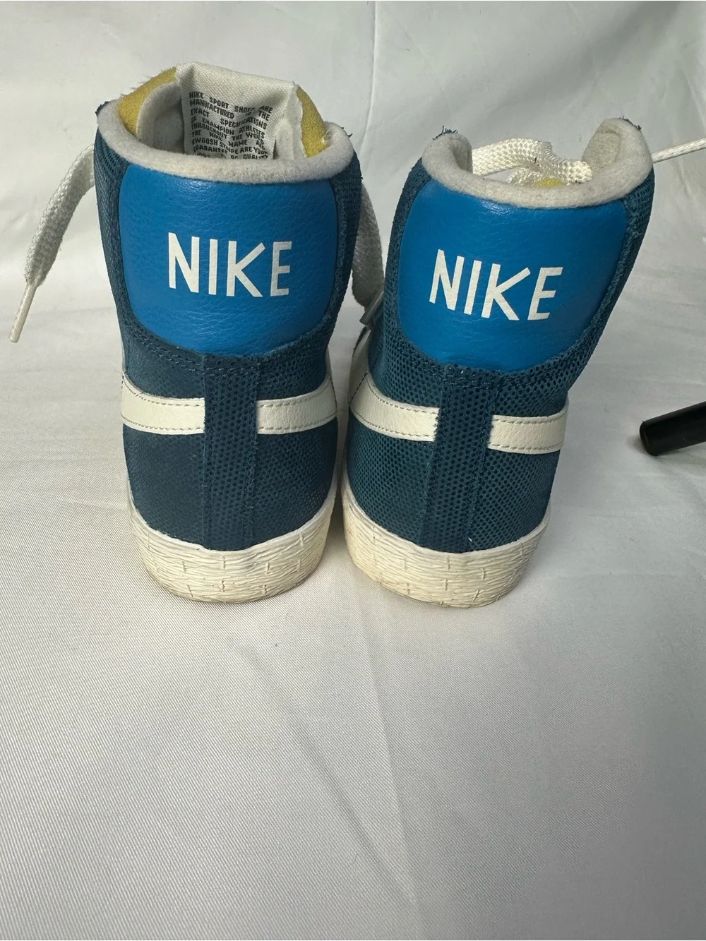 Nike Blue High-Top Sneakers with White Swoosh